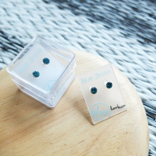 SWA COLL : ROUND BLUE ZIRCON SILVER STUD EARRINGS