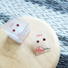Load image into Gallery viewer, SWA COLL : ROUND RUBY SILVER STUD EARRINGS